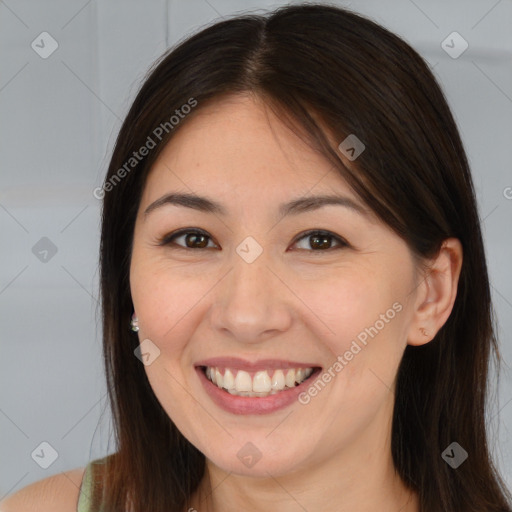 Joyful white young-adult female with long  brown hair and brown eyes