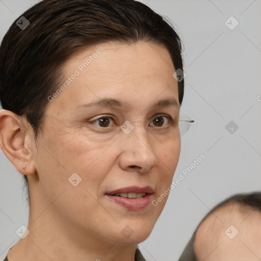 Joyful white adult female with short  brown hair and brown eyes