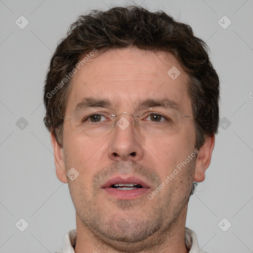 Neutral white adult male with short  brown hair and brown eyes