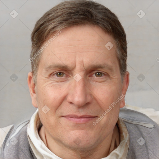 Joyful white middle-aged male with short  brown hair and brown eyes