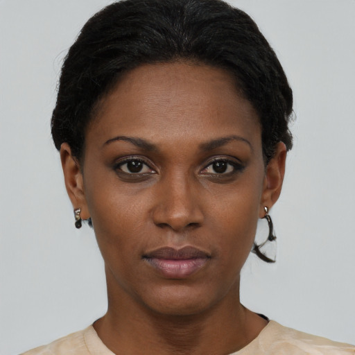 Neutral black young-adult female with short  black hair and brown eyes