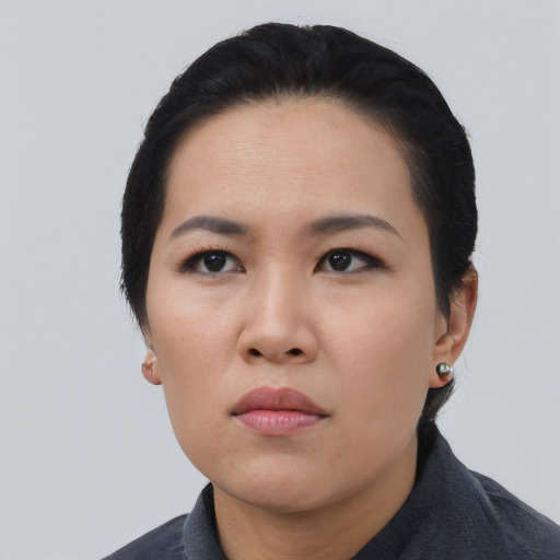 Neutral asian young-adult female with short  black hair and brown eyes