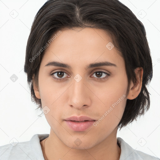 Neutral white young-adult female with medium  brown hair and brown eyes