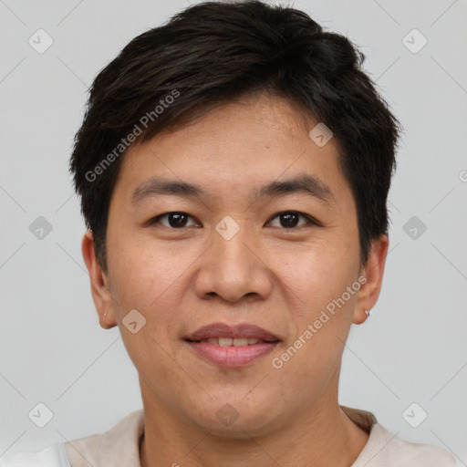 Joyful asian young-adult male with short  brown hair and brown eyes