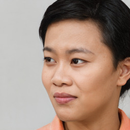 Joyful asian young-adult female with short  black hair and brown eyes