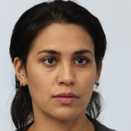 Neutral asian young-adult female with medium  brown hair and brown eyes