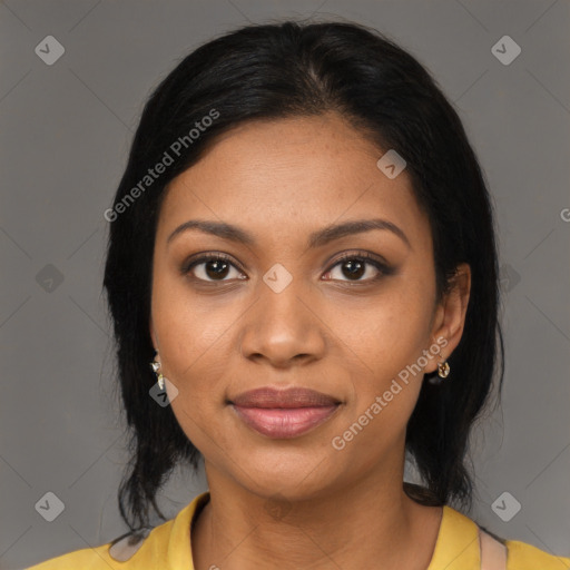 Joyful black young-adult female with medium  black hair and brown eyes