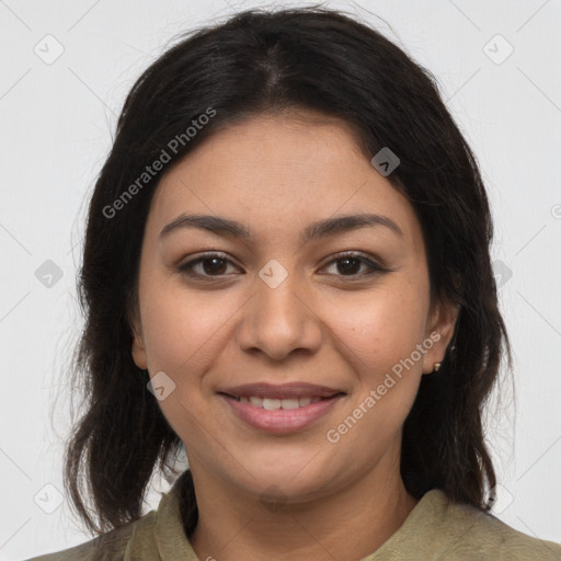 Joyful latino young-adult female with long  brown hair and brown eyes