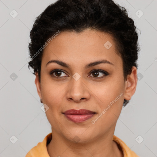 Joyful latino young-adult female with short  brown hair and brown eyes