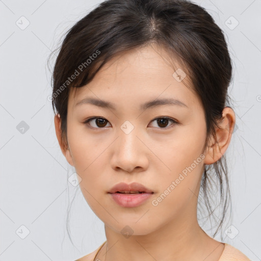 Neutral asian young-adult female with medium  brown hair and brown eyes