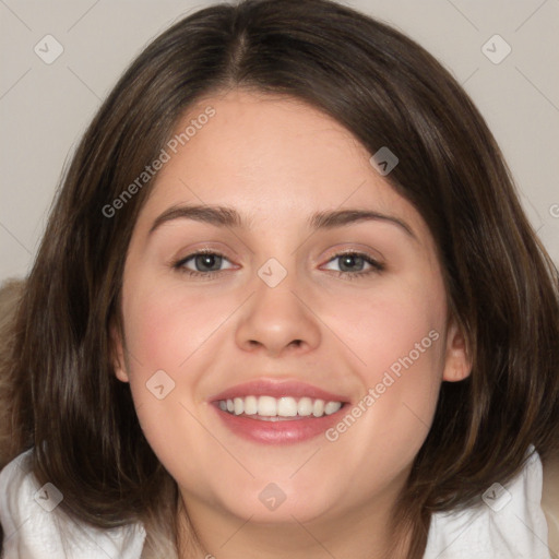 Joyful white young-adult female with medium  brown hair and blue eyes