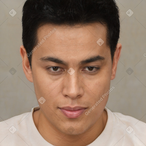 Joyful latino young-adult male with short  brown hair and brown eyes