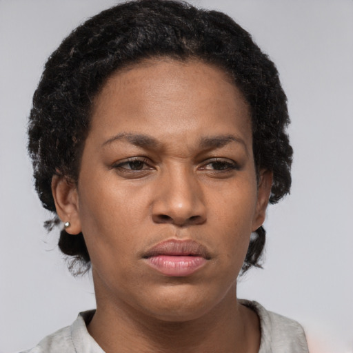 Neutral latino young-adult female with short  brown hair and brown eyes