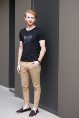 Emirati young adult male with  ginger hair