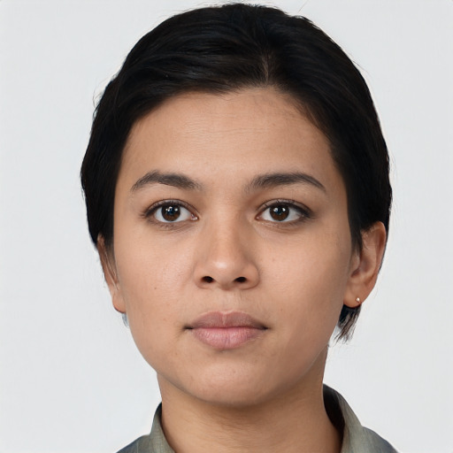 Neutral asian young-adult female with short  black hair and brown eyes