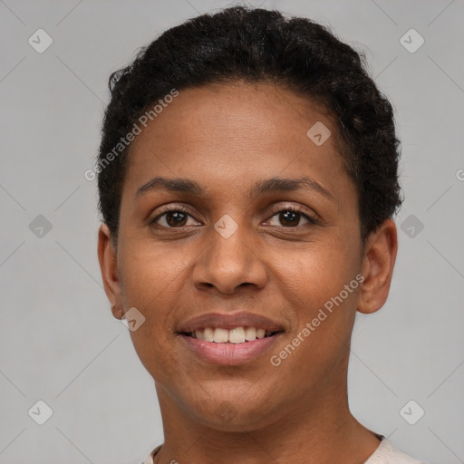 Joyful black young-adult female with short  brown hair and brown eyes