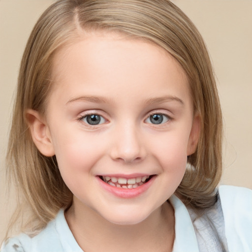 Joyful white child female with medium  brown hair and blue eyes