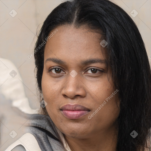 Joyful black young-adult female with long  black hair and brown eyes