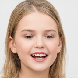 Joyful white child female with medium  brown hair and brown eyes