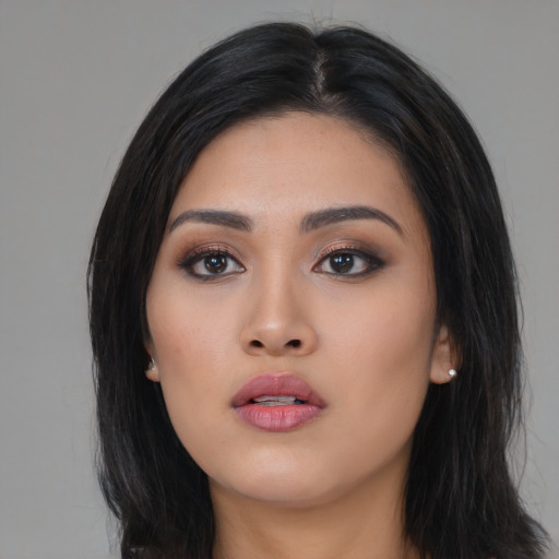 Neutral asian young-adult female with long  black hair and brown eyes