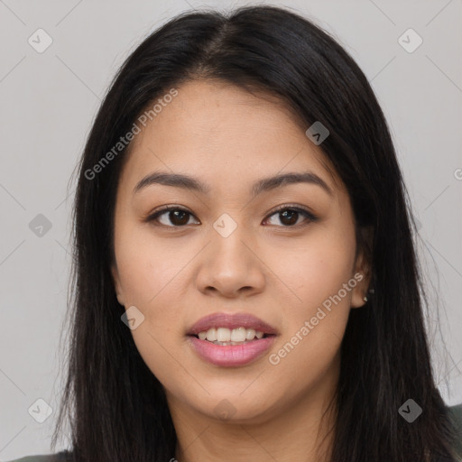 Joyful asian young-adult female with long  brown hair and brown eyes