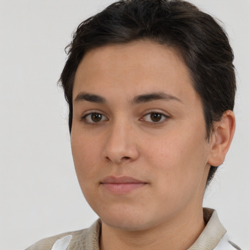 Neutral white young-adult female with short  brown hair and brown eyes