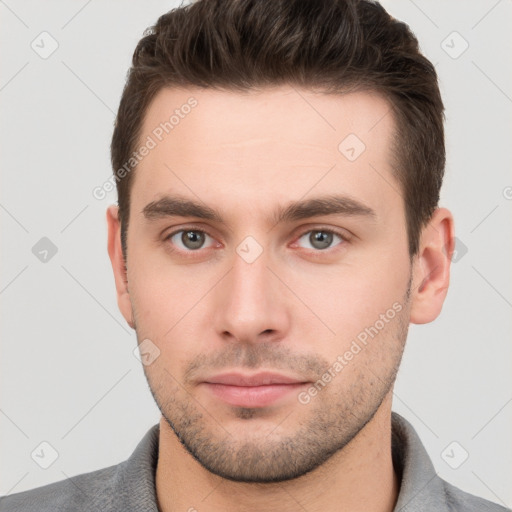 Neutral white young-adult male with short  brown hair and grey eyes