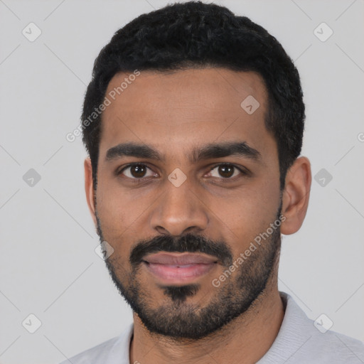 Neutral latino young-adult male with short  black hair and brown eyes