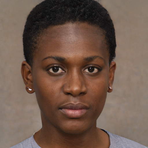 Neutral black young-adult female with short  black hair and brown eyes