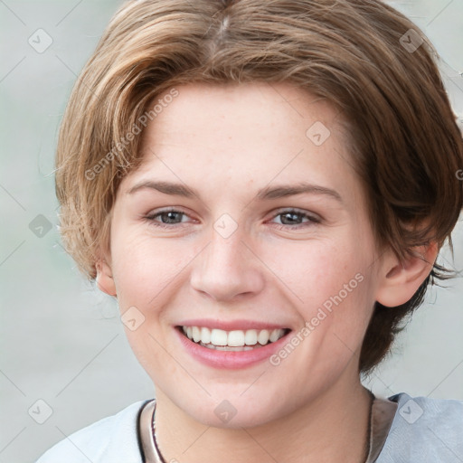 Joyful white young-adult female with medium  brown hair and brown eyes