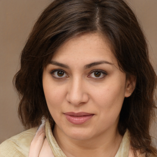Joyful white young-adult female with medium  brown hair and brown eyes