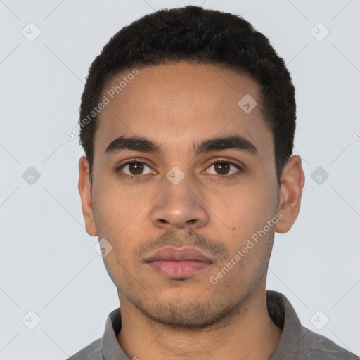 Neutral latino young-adult male with short  black hair and brown eyes