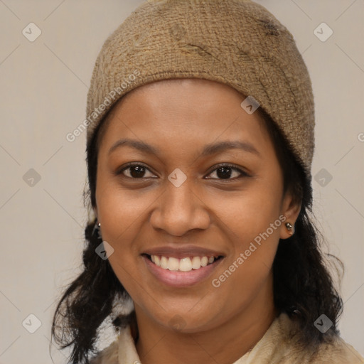 Joyful black young-adult female with medium  brown hair and brown eyes