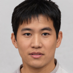 Neutral asian young-adult male with short  black hair and brown eyes