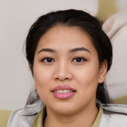 Joyful asian young-adult female with medium  black hair and brown eyes