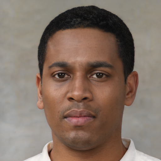 Neutral black young-adult male with short  black hair and brown eyes