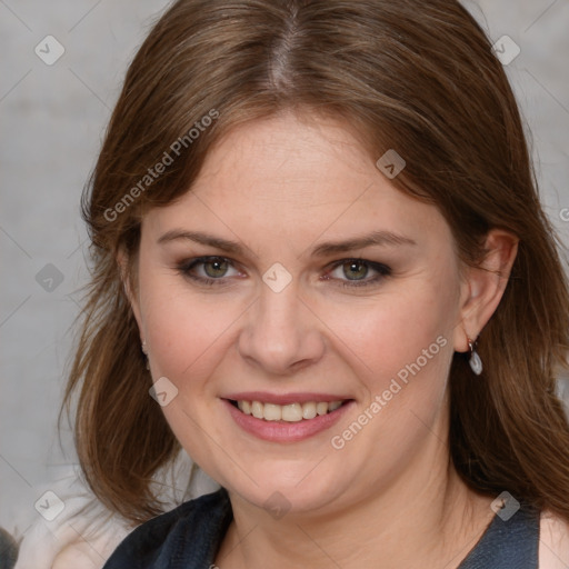 Joyful white young-adult female with medium  brown hair and blue eyes