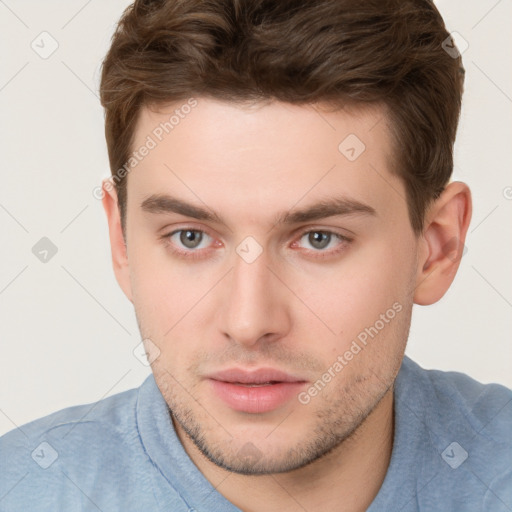 Neutral white young-adult male with short  brown hair and brown eyes