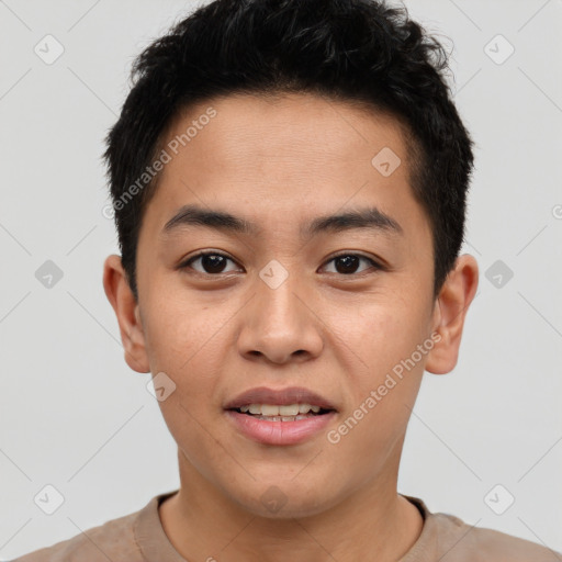 Joyful asian young-adult male with short  black hair and brown eyes