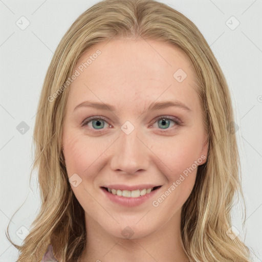 Joyful white young-adult female with long  brown hair and blue eyes