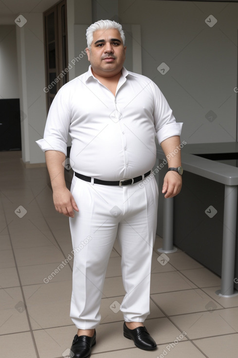 Iraqi middle-aged male with  white hair