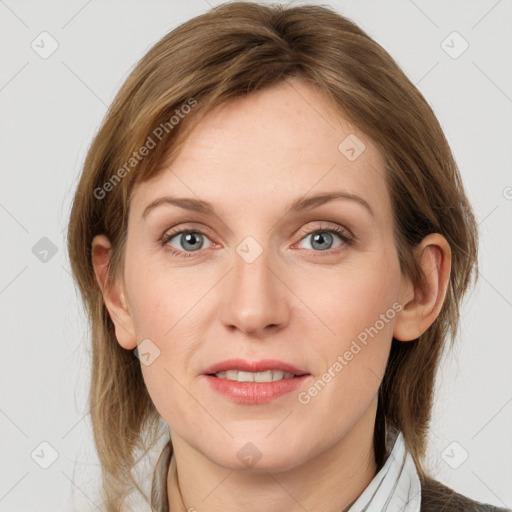 Joyful white young-adult female with medium  brown hair and blue eyes