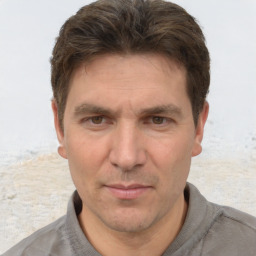 Neutral white adult male with short  brown hair and brown eyes