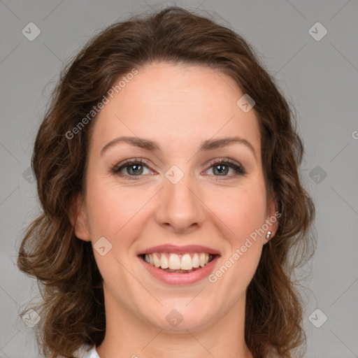 Joyful white young-adult female with medium  brown hair and green eyes