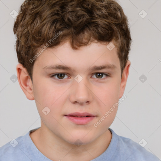 Joyful white child male with short  brown hair and brown eyes