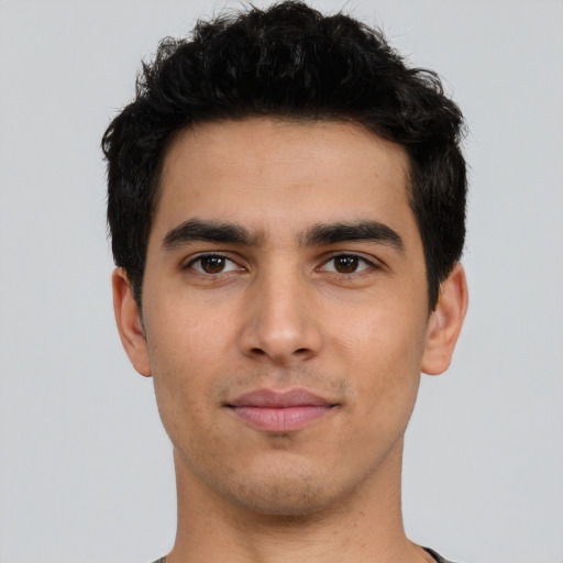 Neutral white young-adult male with short  black hair and brown eyes