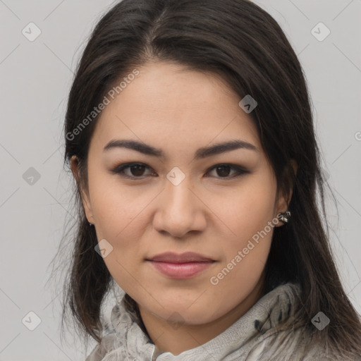 Joyful latino young-adult female with long  brown hair and brown eyes