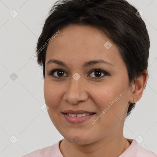 Joyful white young-adult female with short  brown hair and brown eyes