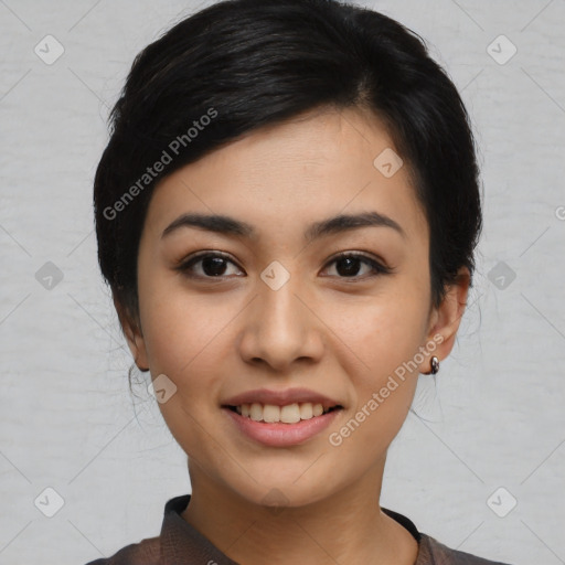 Joyful asian young-adult female with medium  black hair and brown eyes