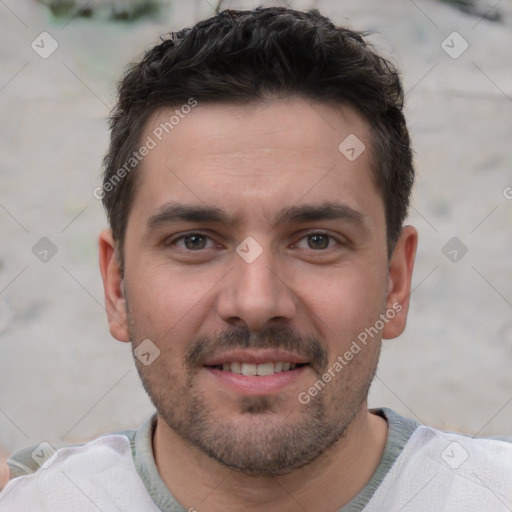 Joyful white young-adult male with short  brown hair and brown eyes